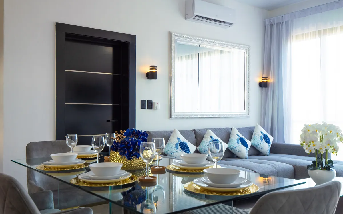 Dining table and sofa, 2 Bedroom Apartment, Rizz Suites