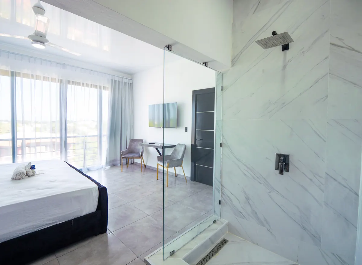 Bedroom and rain shower, 2 Bedroom Apartment, Rizz Suites