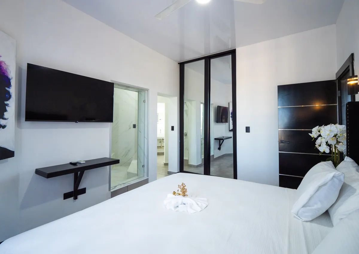 Bedroom with TV, 2 Bedroom Apartment, Rizz Suites